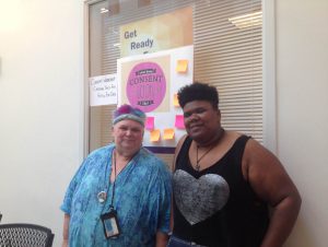 Loraine and Micai Newsome, a favorite student, at Montgomery College where Loraine teaches interdisciplinary sexuality studies, Fall semester 2016. They were hosting a New Students Welcome Fair table focused on teaching students, “What consent is … .” Photo courtesy of Loraine Hutchins.
