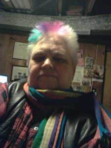 Loraine colors her hair with the colors of the bi flag: pink, purple, and blue. Photo courtesy of Loraine Hutchins.