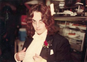 Mary, age 25, as a master of ceremonies for the local Humboldt County, CA Halloween dance. The persona was called Dread Weatherly. Marcus writes, “I was secretly in love with that tux and tails.”