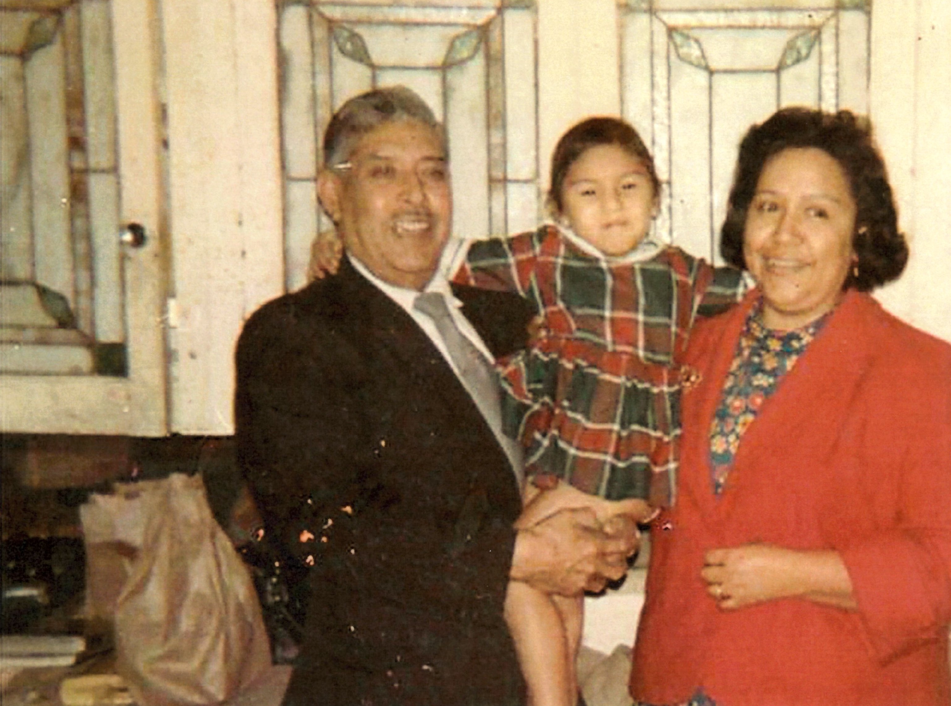 Photo of Marianne Diaz’s (L-R) Dad, cousin Angel, and Mom. Angel, being the closest cousin in a family of 9 kids, had Marianne Diaz’s parents as godparents.