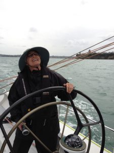 Dee at the helm of the NZ America’s Cup boat; Auckland, New Zealand, 2012. Photo courtesy of Nanette Gartrell and Dee Mosbacher.