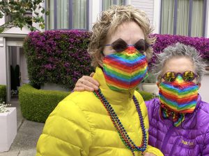 Nanette and Dee looking festive for Pride, while celebrating at home during the Covid pandemic, 2020. Photo courtesy of Nanette Gartrell and Dee Mosbacher.