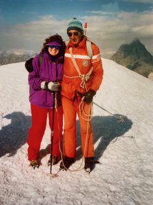 Dee with a mountain guide atop Breithorn Mountain, Switzerland, 1992. Photo courtesy of Nanette Gartrell and Dee Mosbacher.