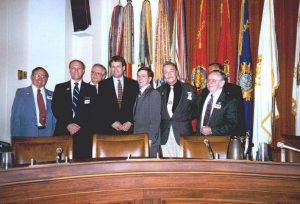 L-R: Mel Tips, Cliff Arnesen, Patrick Bova, Lane Evans, Edward Clayton, Johnscott McWilliams, and Jim Darby attend the William Joiner Center’s Congressional Conference on The Concerns of Vietnam Veterans, Washington D.C., May 1997. Photo courtesy of Cliff Arnesen.