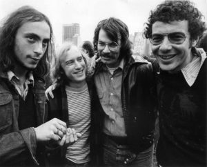 (L-R): Steven Grossman, Ronald Helman, Miles Brown, and Perry Brass, 1973, Central Park, New York City, NY. Perry shares: “This picture was taken at an anti-war demonstration in Central Park. On the far left is Steven Grossman, a singer-songwriter who became the first openly gay performer to be signed to a major record label, Decca Records.” Photo courtesy of Perry Brass.