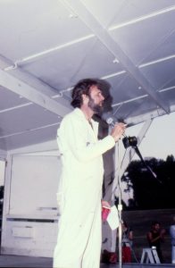 Ray Hill onstage at the rally the day before the National March on Washington for Lesbian and Gay Rights, 1979. Photo courtesy of Ray Hill.