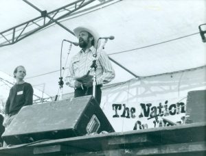 Ray Hill onstage at the National March on Washington for Lesbian and Gay Rights, 1979. Photo courtesy of Ray Hill.