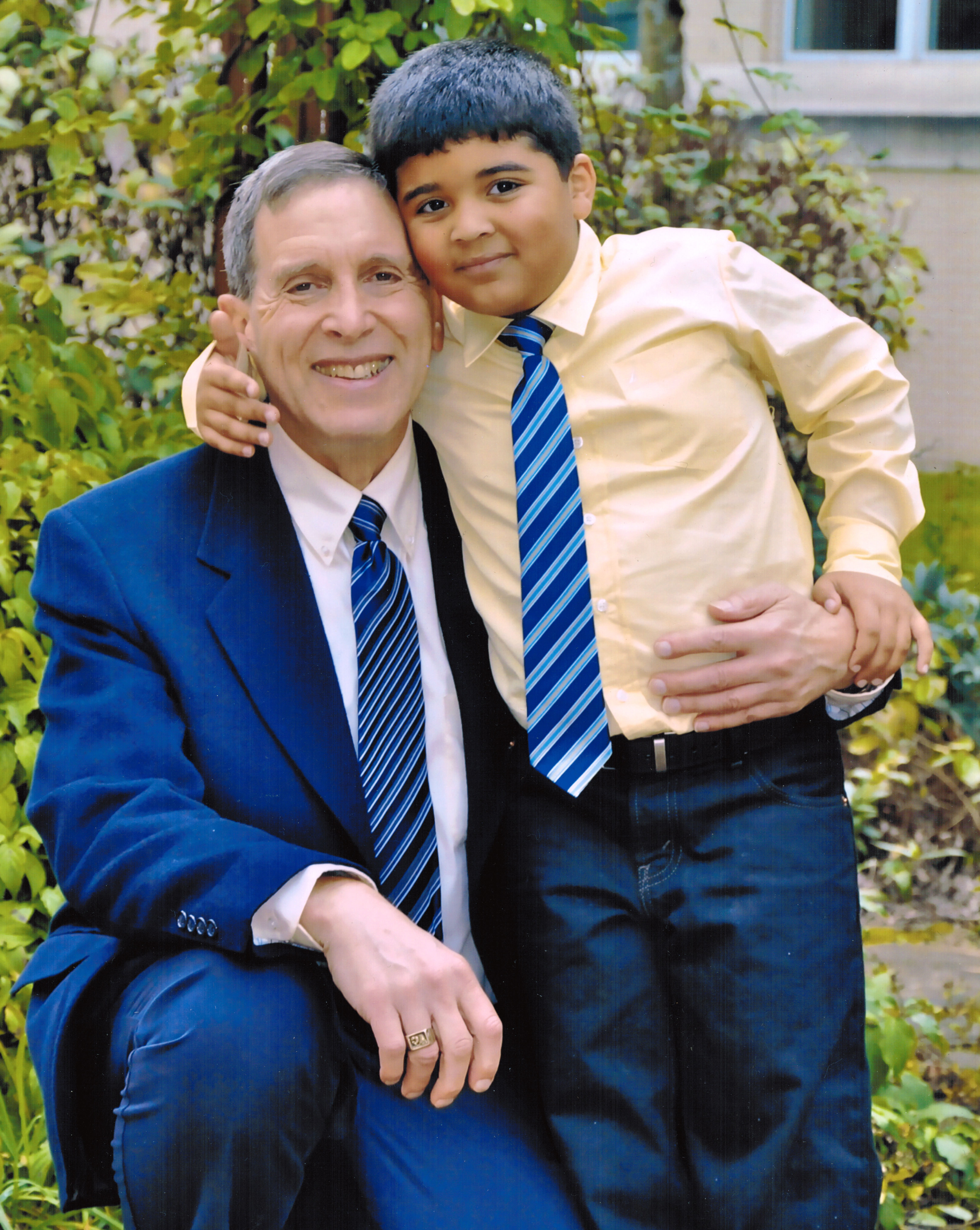 Alan with Ethan at six-years-old outside the King County, WA Courthouse where Alan had just officially become Ethan's father, October, 2011. Alan shares, “It was one of the most joyous days of my life.”