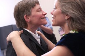 Robyn Ochs and Peg Preble are pronounced married by Town Clerk Pat Ward on May 17, 2004 in Brookline, MA. (Courtesy of Robyn Ochs)