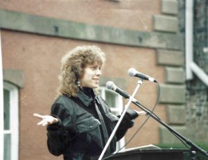 Robyn Ochs speaks at a Tufts University Rally on November 4, 1991, during a campaign to get the University to establish an LGBT center. Robyn taught in Tufts’s Experimental College from 1991-2003. (Courtesy of Robyn Ochs)