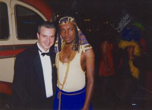 Rodney Church with Carnival employee on Cruising With Pride, a gay-group cruise on Carnival Cruises, c. 1998.