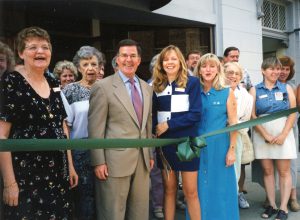 Roy Ashburn and the South East Tulare County (SETCO) Republican Women standing outside of the Chamber of Commerce for the ribbon-cutting ceremony and grand opening of his campaign headquarters, Porterville, CA, September 9th, 1998. Photo courtesy of Roy Ashburn.