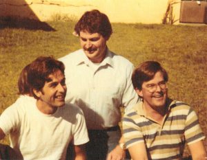 (L-R): Ted Asburn, Dale Ashburn, and Roy Ashburn (at age 28) as adults. Roy shares, “I was always closer to my brother, Dale. Although we never discussed it, Dale was gay and died of AIDS at a very young age.” Photo courtesy of Roy Ashburn.