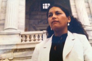 Sharon M. Day is filmed for a video featuring women of color doing policy work on the steps of the Minnesota State Capitol, 1982-83, St. Paul, MN.