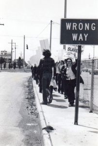 Susan Allen demonstrating in front of the Anti-Choice Conference with a sign reading “Mandatory Motherhood is SLAVERY,” Metairie, LA, 1979.