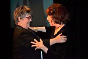 Susan Allen and Lily Tomlin at the HRC Gala in New Orleans during her performance, 2011. Susan shares, “she remembered me and actually stopped her performance to say hello after 35 years.”