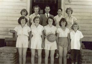 Suzanne Pharr (holding the ball) at Sunny Hill School, 1952.