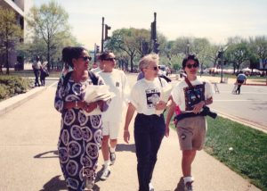 L-R: Beth Richie, Catlin Fullwood, Suzanne Pharr, and Val Kanuha at the March on Washington for Lesbian, Gay and Bi Equal Rights and Liberation, 1993, Washington, D.C.