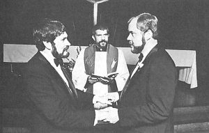 Larry Uhrig (right), pastor of the gay Metropolitan Community Church, was joined in the “rite of holy union” to his longtime roommate, Alan Fox, by Troy Perry, who founded the gay church movement in California. Perry was the only one to cry during the service. Courtesy of Rev. Troy Perry.