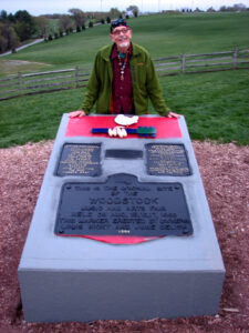David behind the Woodstock site plaque, 2009. 