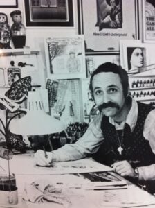 David drawing and surrounded by artwork in his “Yellow Studio”, Chelsea, New York, NY, 1972.