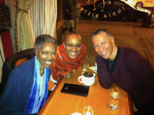 Sharon with her wife Omi Joni Jones having dinner with their mentor/the legend Robbie McCauley in Boston, MA, 2013. Photo courtesy of Sharon Bridgforth.