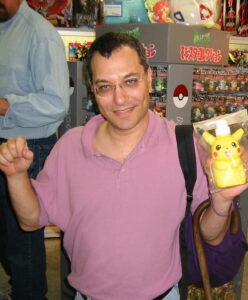 Kenny purchasing his first Pokemon in Tokyo, Japan, 2002.
