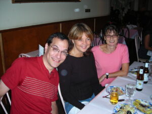 Kenny Fries at dinner with writers Rahna Reiko Rizzuto and Joan Silber, New York City, NY, 2006.