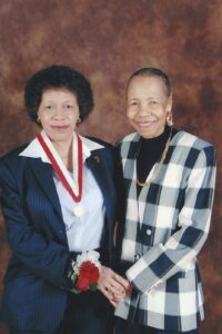 L-R: Beverly Greene and Thelma Greene (her mother) during the Faculty Achievement Medal Award reception at St. John’s University, Queens, NY, 2006. Photo courtesy of Beverly Greene.	