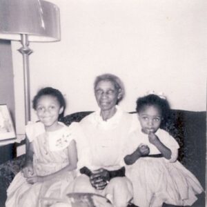 A family portrait of Beverly Greene, her maternal great grandmother, and her younger sister, 1962. Photo courtesy of Beverly Greene.