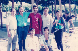 A group portrait of South Asian activists at the Pride parade, San Francisco, CA, 1986. Back row: Suvir Das, Ravi Verma, Arvind’s partner Ashok, Manoj Mehta, and unidentified. Front row: Arvind Kumar and Toufiq.