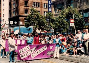 Arvind and other South Asian activists marching in the Pride parade with a purple banner that reads, “Gay South Asians – Trikone”, San Francisco, CA, 1986.