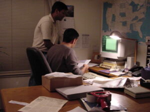 Arvind mail processing at his job, 2002.