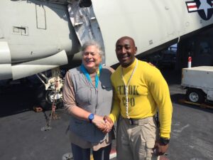 Col. Pritzker with crew member of USS Carl Vinson Nuclear Powered aircraft carrier, July 27, 2016.