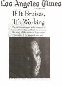 A scan of Mehmet Sander’s feature in Los Angeles Times, June 22, 1997. The article is titled, “If It Bruises, It’s Working”, and captioned, “Mehmet Sander – whose works are generated from a collision and the forces of nature – likes being called a ‘kamikaze choreographer’, but denies all the ‘prince of pain’ stuff.” Reviewer: Jennifer Fisher. Photo courtesy of Mehmet Sander.