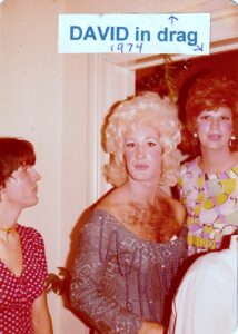 David (at right) at a drag party with his friend and landlord, 1974.