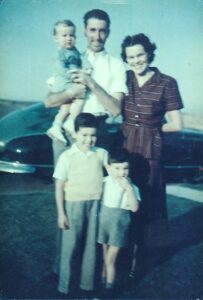 David (as the shortest standing) and his family, circa 1950. 