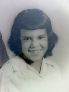 A portrait of Carolyn at age 5. Photo courtesy of Carolyn Brandy.
