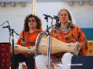 Annette Acosta and Carolyn Brandy with their drums, 2007. Photo Credit: DJ Lacoqi. Photo courtesy of Carolyn Brandy.