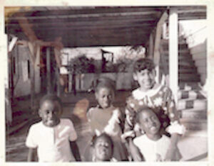 Gina Brown, Larry Brown (brother), Yolanda Brown (sister), Pam Brown (sister), and Angela (cousin), 1968. Photo courtesy of Gina Brown.