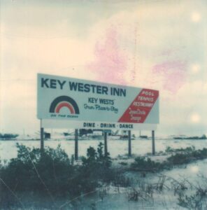 A billboard for Mel’s hotel the Key Wester Inn that reads, “Key West’s Fun Place to Stay on the Ocean. Pool, Tennis, Restaurant, Inner Circle Lounge: Drink - Dine - Dance”. He owned the Majda facility in Key West, FL from 1976 to 1985.