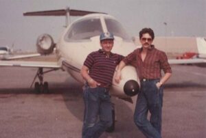 Mel and his long-term partner Jim Ross at the airport, getting ready to fly to Key West, FL where Mel owned a major motel, 2004.