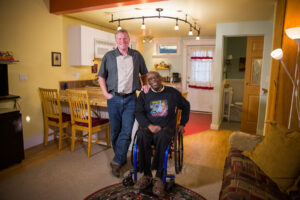 Rupert with Scott Stapley, his long-time partner of 31 years, at the Kinley Manor Guest House, their three-level building they had constructed in 2006. 