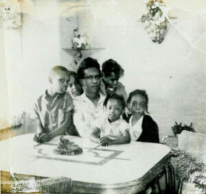 The Kinnards living in the projects, 1963. L-R: Rupert, Maxine (sister), Viola (mother), Luredia (sister), Rochelle (sister), and Annette (sister). 
