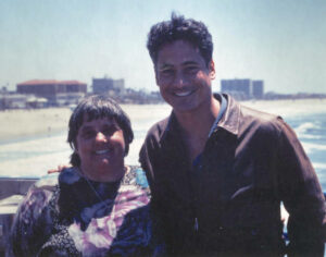 Judy Abdo with Greg Louganis, Olympic Gold-medalist diver, at an event, possibly at Santa Monica Pier, CA, 1990s. Photo courtesy of Santa Monica Public Library Image Archives, Judy Abdo Photo Album Collection.
