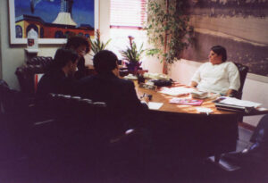Judy Abdo (sitting behind the desk) meeting the Planning Department staff in the Mayor’s office, Santa Monica City Hall, 1990s. Photo courtesy of Santa Monica Public Library Image Archives, Judy Abdo Photo Album Collection.