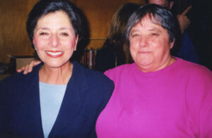 L-R: Barbara Boxer (former U.S. Senator for California) and Judy Abdo smiling together in Santa Monica, CA, 1994. This photo was taken during Boxer's trip to Santa Monica after the Northridge earthquake. Photo courtesy of Santa Monica Public Library Image Archives, Judy Abdo Photo Album Collection.