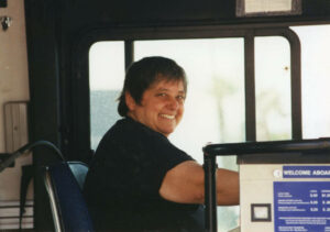 Judy Abdo in the driver's seat of a Big Blue Bus as part of the “Bus Rodeo Day” activities, 1996. “Bus Rodeo Day” was for Santa Monica's city leadership to learn about the city's public transit system. Photo courtesy of Santa Monica Public Library Image Archives, Judy Abdo Photo Album Collection.