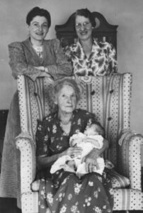 Judy as a newborn with her mother, grandmother, and great-grandmother. Photo courtesy of Judy Abdo.