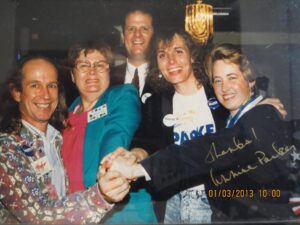 Deborah with “Team Parker”, the campaign team for future Houston Mayor Annise Parker’s first winning City Council Campaign, January 1, 2013. The signature in gold reads, “Thanks! Annie Parker”. Photo courtesy of Deborah Moncrief Bell.